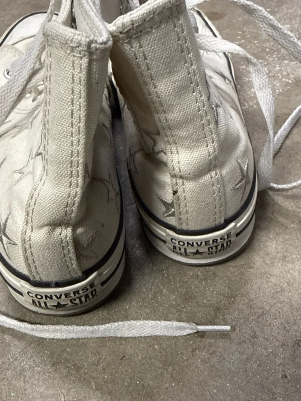 Converse White High-Top Canvas Sneakers with Star Accents